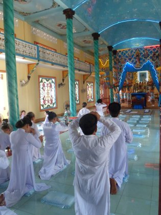 Worshippers in Cao Dai Temple