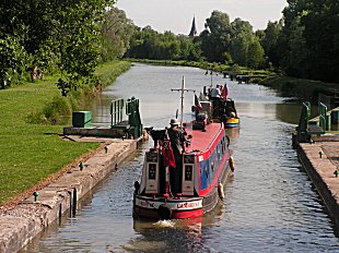 Rosie and Temujin leaving the lock at Frise