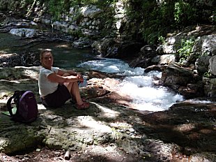 Sue by the stream.